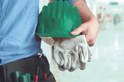 Symbolbild VDSI Person Helm Werkzeug